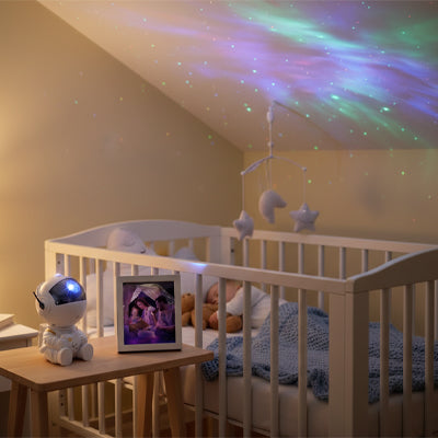 Veilleuse bébé projecteur astronaute étoiles